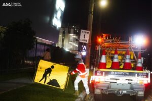 Traffic Management Team Installing Roadwork Signs
